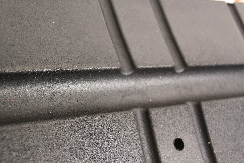 Close-up of the rubber surface and mounting hole of the ECO-TRUCK STOP